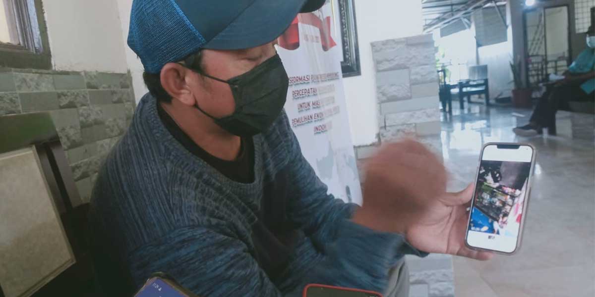 seorang-pria-terekam-cctv-curi-uang-di-kios